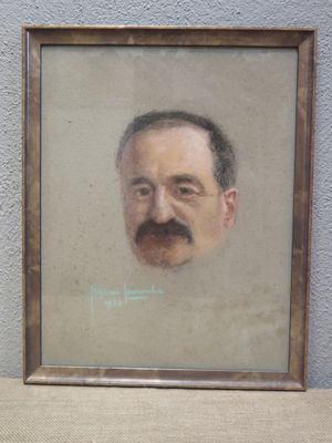 portrait of a man with a mustache and moustache in a wooden frame