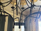 a chandelier that is hanging from the ceiling in the room