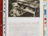 an old photo of a factory with a lot of papers