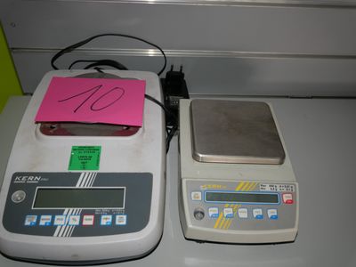 a scale with a pink note on it next to a scale with a pink note on it