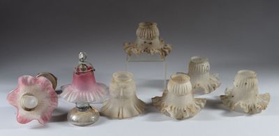 a lot of figurines that are sitting on a table