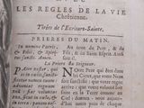 an old book with a picture of a woman on it