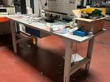 an image of a workbench in a warehouse