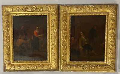 two paintings of a man and woman in gold frames on a wall