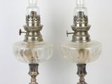 pair of antique brass and glass oil lamps with a clear glass shade