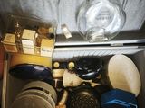 a suitcase filled with bottles of alcohol and other items