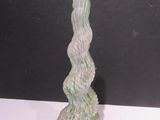 a glass vase that is sitting on a table