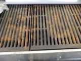 a grill that has a lot of food on it