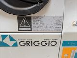 a close up of a machine with a button on it