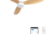 a white ceiling fan with a remote control next to a cell phone