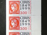 a stamp with a picture of a woman on it on a table