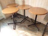 three tables that are sitting next to each other on the floor