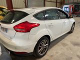 a white car that is parked in a garage