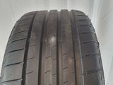 a close up of a tire on a white background