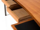 an image of a wooden desk with a drawer underneath it