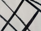 a black and white drawing of lines on a white paper