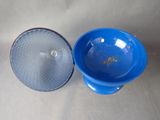 a blue bowl and a blue bowl on a table