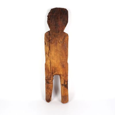 an image of a wooden sculpture of a person on a white background