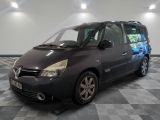 a picture of a black minivan parked in a garage