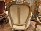 a chair that is sitting in the middle of a room
