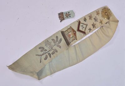 a piece of cloth with a design on it and a piece of cloth with a design on it