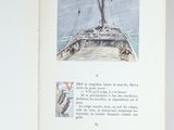 an open book with a picture of a bird on it