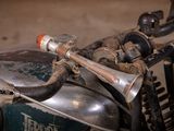 a close up of a motorcycle that has a horn on it