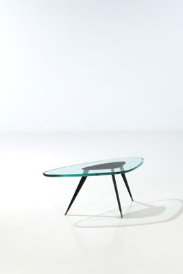 an image of a glass coffee table with a black base