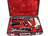 a black case with a set of musical instruments in it