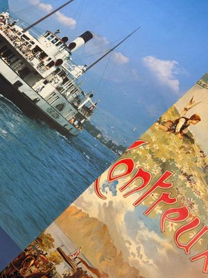 a picture of a book with a picture of a ship on it