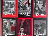 four books of ermo are on a table with a black and white photo