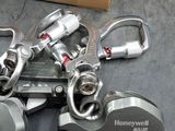 a lot of different types of clamps on the floor