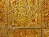 an old wooden door with intricate carvings and designs on it