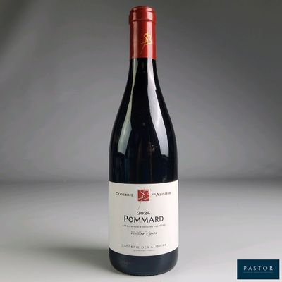 a bottle of wine that is sitting on a table