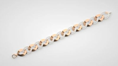 a gold and silver bracelet with a diamond clasp