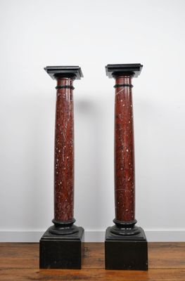 pair of antique red marble columns on black marble bases