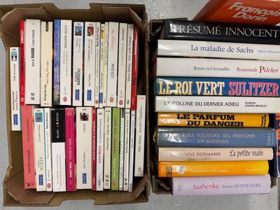 a lot of books in a box on the table