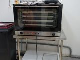 a microwave oven sitting on a table in a room