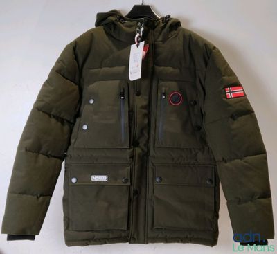 a close up of a jacket hanging on a wall