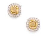 une paire de boucles d'oreilles en diamants jaunes et blancs