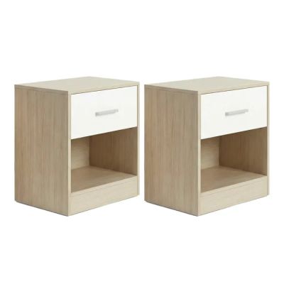 two white nightstands with drawers on each side of them