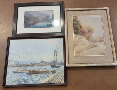 three framed paintings of boats on a table next to a wall