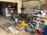 a garage with a lot of junk in it