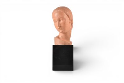 an image of a sculpture of a woman ' s head on a black stand
