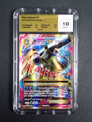 a close up of a pokemon card in a plastic case