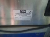 an image of a close up of a label on a stainless steel refrigerator