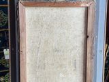 painting on easel with easel and easel stand in front of it