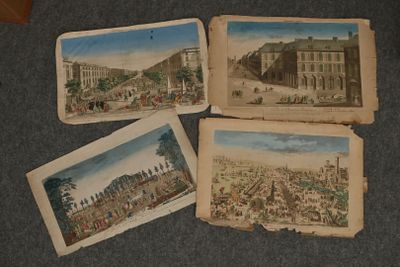 four old postcards of a city with buildings and people on them