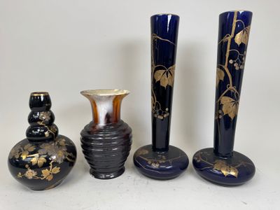 three vases are sitting next to each other on a table