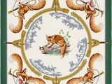 une image représentant un chat et un oiseau sur une assiette
